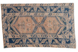 Distressed vintage Turkish Melas rug with hooked geometric medallions in beige and cobalt blue, 4'7
