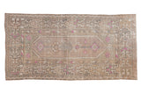 Distressed Oushak runner with floral medallion, geometric border, muted beige and fuchsia, 2'7