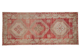 Vintage distressed Oushak runner with three oversized diamond medallions in dusty raspberry red and sand.