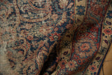 Vintage Northwest Persian rug, worn pile with visible foundation, navy, red, teal floral border.
