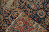 Folded vintage Northwest Persian rug corner highlighting wear across to foundation with patterned field, and side selvage.