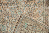 Distressed Hamadan carpet's pile with exposed foundation, revealing its tightly woven reverse.