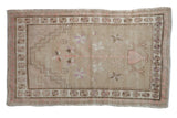 Distressed vintage Oushak rug with beige, pink tree of life, prayer niche, and pinwheel border. 2'7