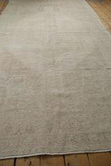 Distressed vintage Oushak rug pile with subtle abrashes and even wear.