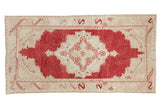 Hand knotted distressed vintage Oushak runner: cinnabar red medallion, ivory floral details, serpent border.