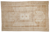Vintage Oushak carpet with distressed shield medallion in softened beige and ivory, 6'5