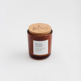 Slow North Orange and Clove soy candle with etched cork lid.