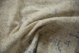 Distressed texture of a vintage Sivas rug, revealing knot heads and faded cobalt blue.