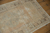Distressed vintage Oushak rug showing mostly even wear to knot heads and foundation.