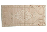 Distressed vintage Oushak runner rug with scalloped medallion, plant finials, neutral, seafoam, 1'8