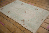 Surface texture showing even wear across the knot heads of the Melas rug.
