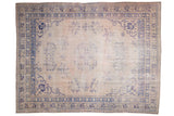 Hand knotted Vintage Distressed Oushak rug, pale pink field, cobalt blue floral medallion.