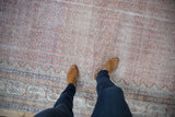 Distressed hand knotted Sparta carpet, pale rust and indigo allover boteh pattern.