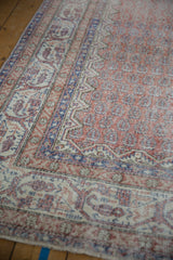 Distressed vintage Turkish Sparta rug with pale rust and indigo geometric borders.