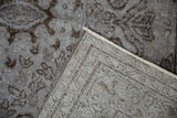 Tightly hand-knotted foundation and intact side selvage of the distressed Oushak rug.