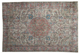 Distressed Overdyed Oushak carpet with faded roundel medallion and vinery in terracotta, blue, and ivory, 5'2