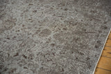 Distressed Oushak carpet showing even wear, faint foundation, silver and chocolate brown vinery.
