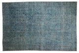 Distressed overdyed Oushak carpet with faded denim blue, allover floral vinery, 6' x 9'1