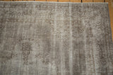 Detail of the Distressed Overdyed Oushak Carpet, with oxidized silver tones and worn pile texture.