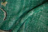 Distressed vintage Turkish Art Deco rug, pale turquoise green-blue pile with mostly even wear showing foundation.