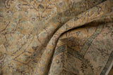 Distressed pile of vintage Sparta carpet with pale mauve, green, and dusty gold patterns.