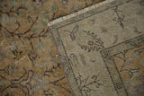 Distressed Sparta rug pile, showing mostly even wear to knot heads and hand-knotted reverse.