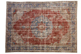 Vintage distressed Sivas carpet, cherry red field, faded blue medallion, ivory arabesques, 7'6