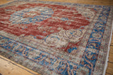 Distressed Sivas carpet corner, sky blue border with scrolling arabesques, worn cherry red field.