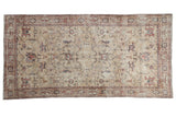 Distressed Vintage Turkish Sparta rug runner, allover field of faded floral palmettes in beige, red, and navy, 3'8