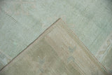 Hand-knotted foundation and secured side cord selvages of a vintage Oushak rug.