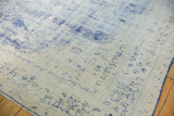Vintage Distressed Oushak carpet with wear to foundation and faded cobalt blue motifs.