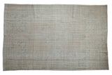 Soft ivory, cream, and seafoam green distressed vintage Turkish Oushak rug with faded medallion, 6'6