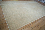 Intact side cord selvage and worn pile of the distressed vintage Oushak carpet.