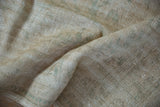 Distressed pile of the vintage Oushak rug, showing wear and visible foundation.