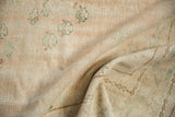 Distressed Oushak pile texture with abrashes and subtle pale rose, sea foam green hues.