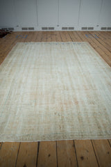 Reverse side of a vintage Oushak showing the tightly woven foundation and expert repairs.