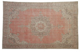 Distressed Vintage Sparta Carpet, blush field with central roundel medallion and oxidized silver borders.