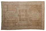 Distressed Oushak rug with oversize shield medallion, rams horn motifs, geometric border, beige.