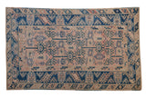 Vintage distressed Turkish Melas rug, geometric dusty rose field, indigo blue border, 4'2