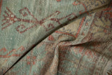 Even wear across the knot heads reveals the soft texture of this vintage Turkish Oushak.