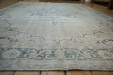 Distressed Sparta Carpet with textured low pile showing foundation and faded patterns.