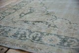 Vintage distressed Sparta carpet pile with visible wear to foundation and knot heads.
