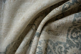 Distressed vintage Sparta carpet with worn texture exposing the foundation.