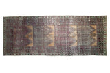 Vintage Distressed Oushak rug runner with aubergine and saffron panels, geometric border.
