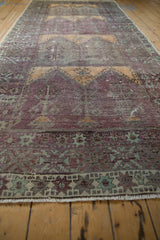 Vintage Distressed Oushak runner detail: low pile, aubergine, mint, saffron tree-of-life motif.