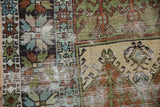 A close-up view of the distressed wear and knot heads on a hand-knotted Oushak runner.