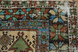 Heavy wear on the corner of a vintage Oushak runner reveals the ivory foundation amidst floral patterns.