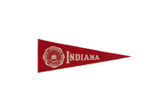 Vintage red felt Indiana University pennant, white school crest, 3.5x9.5 inches.