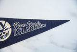 Dark blue felt New York Islanders pennant tip with white lettering and subtle texture.