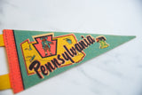 Vintage Pennsylvania felt pennant with retro graphics and teal, yellow colors.